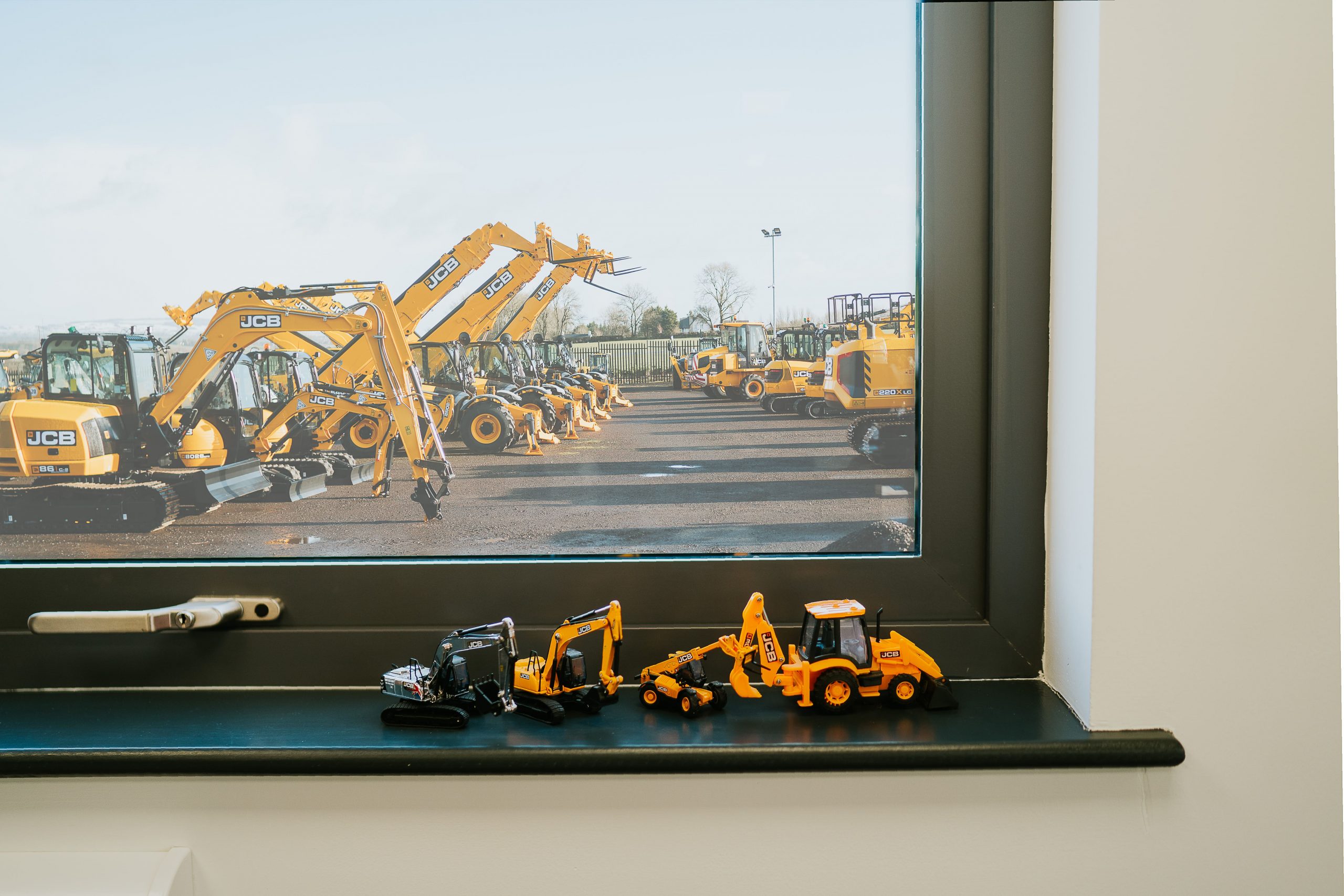 off site construction smartbuild modular office digger yellow toy window