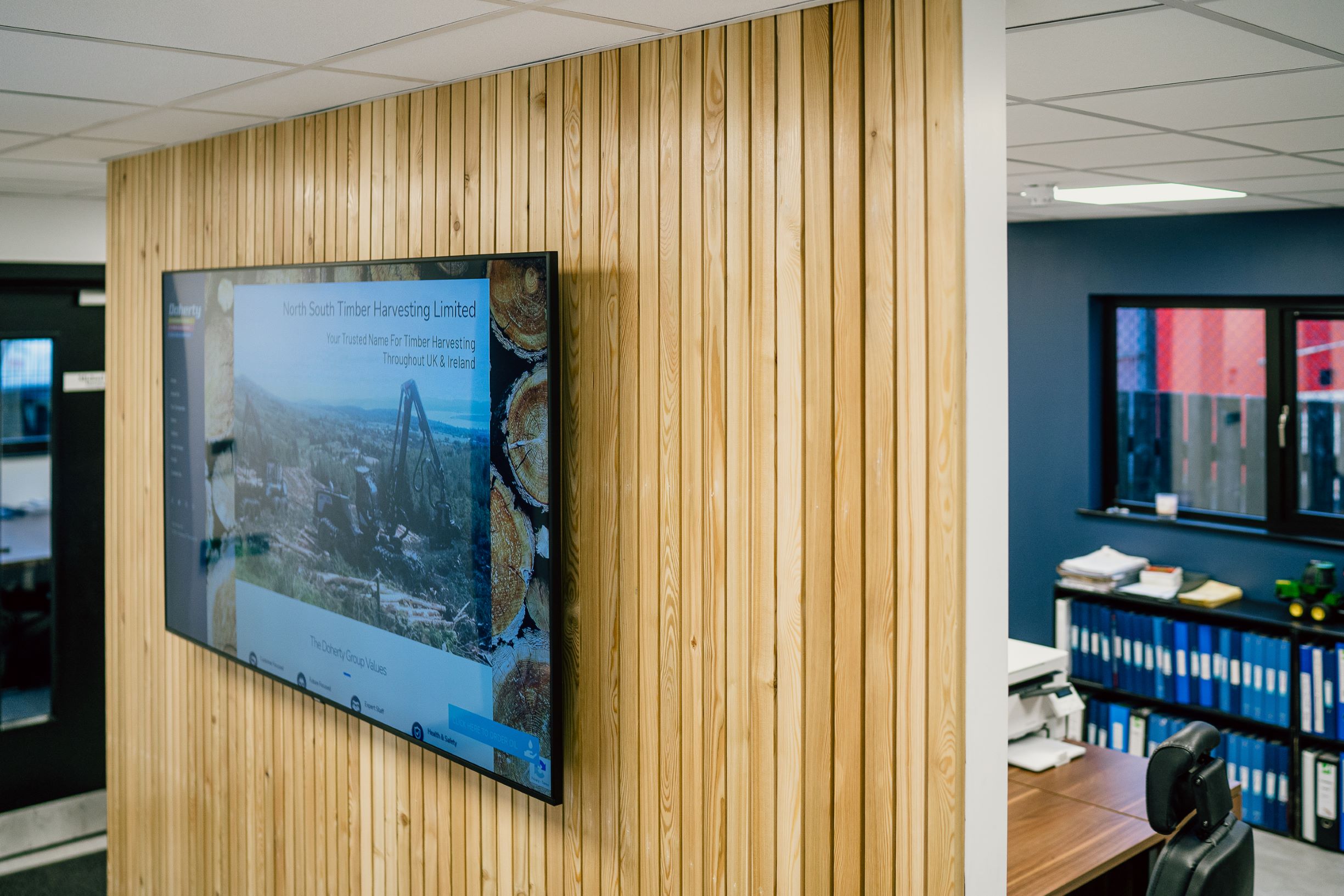 Bespoke wood panel tv modular office