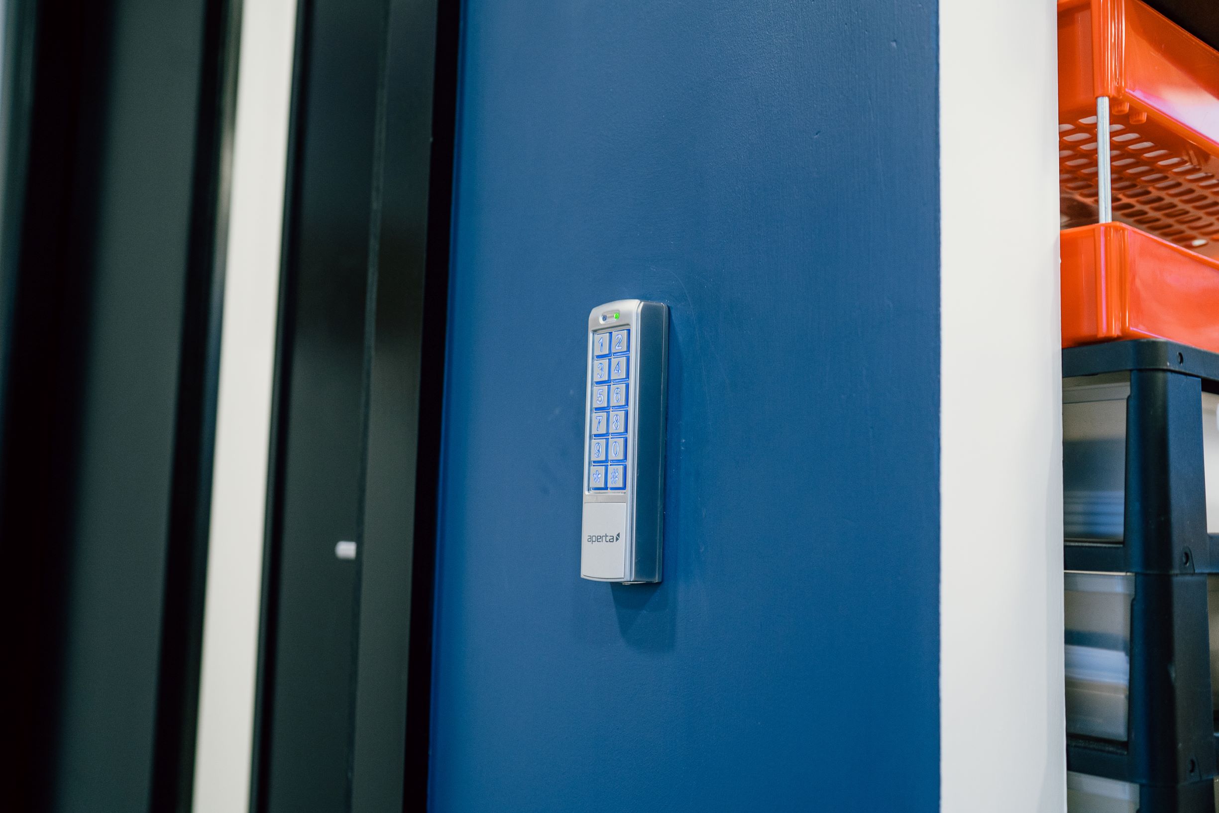 modular office buidling interior blue key pad wall